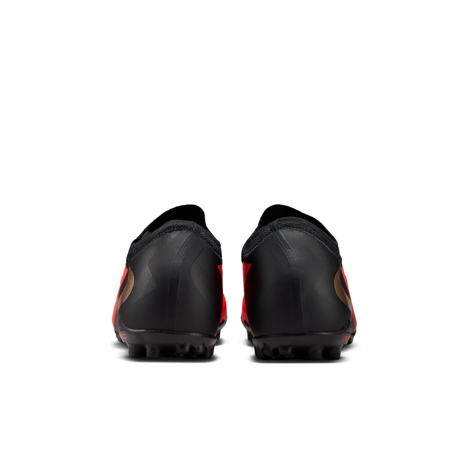 Nike Phantom 6 Low Pro TF red and black turf soccer shoes with VNMSkin upper and rubber outsole.