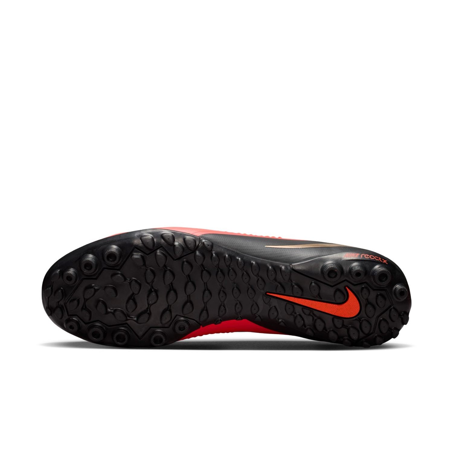 Nike Phantom 6 Low Pro TF red and black turf soccer shoes with VNMSkin upper and rubber outsole.