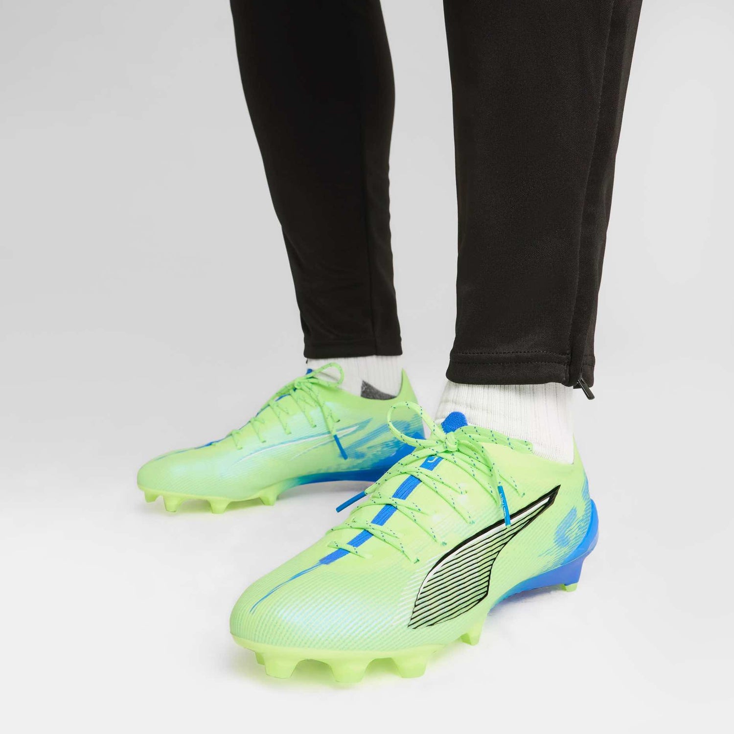 PUMA ULTRA 5 Ultimate FG Soccer Cleats for firm ground with SPEEDSYSTEM outsole.