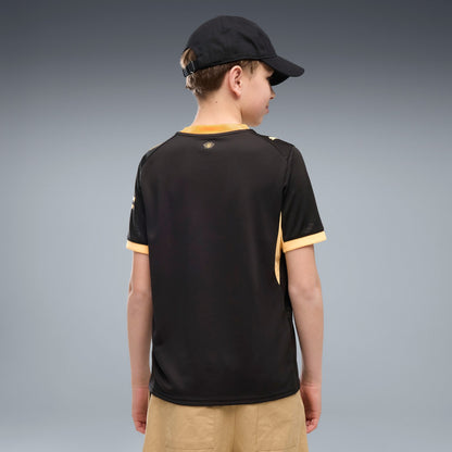 Manchester City Away Jersey Youth in black with gold PUMA and club details.