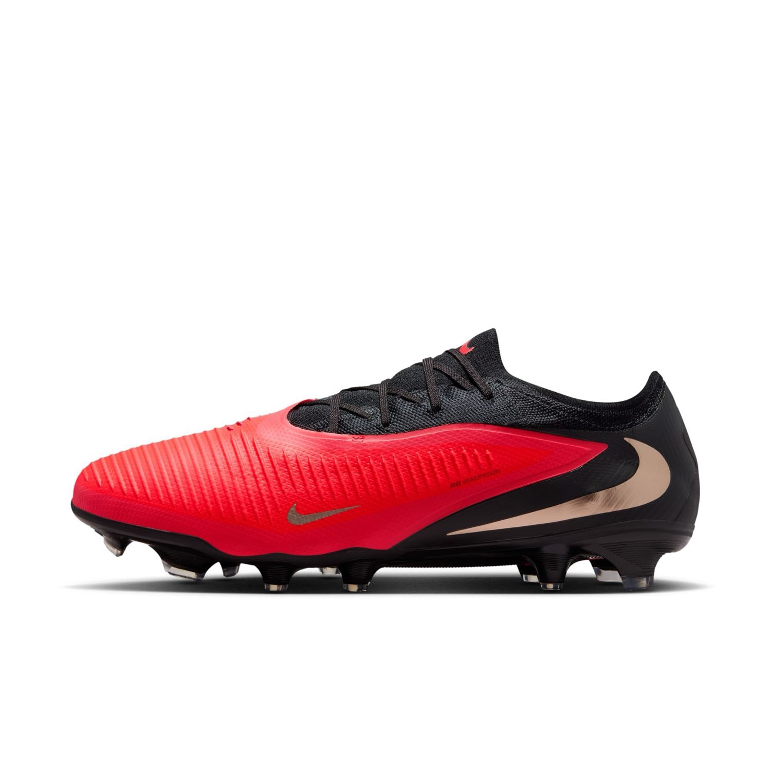 Nike Phantom 6 Low Pro FG red and black firm-ground soccer cleats with VNMSkin upper and Cyclone 360 traction plate.