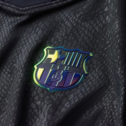 FC Barcelona 2026/27 Stadium Away Jersey Youth in black and purple.