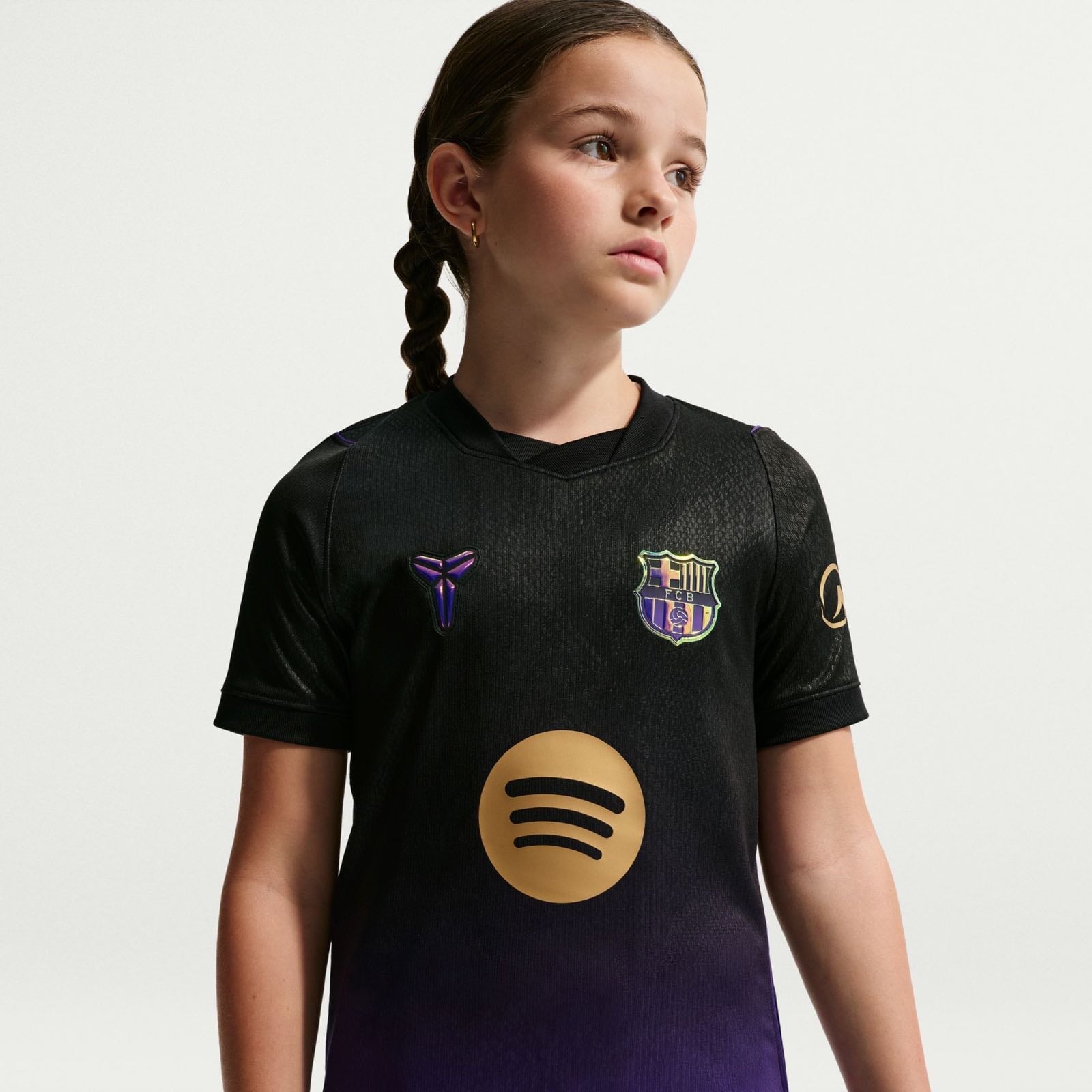 FC Barcelona 2026/27 Stadium Away Jersey Youth in black and purple.