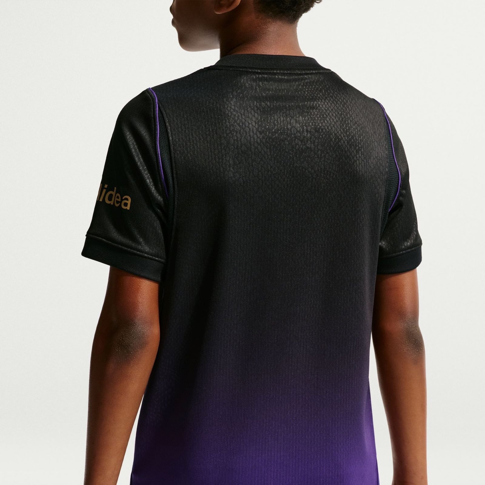 FC Barcelona 2026/27 Stadium Away Jersey Youth in black and purple.