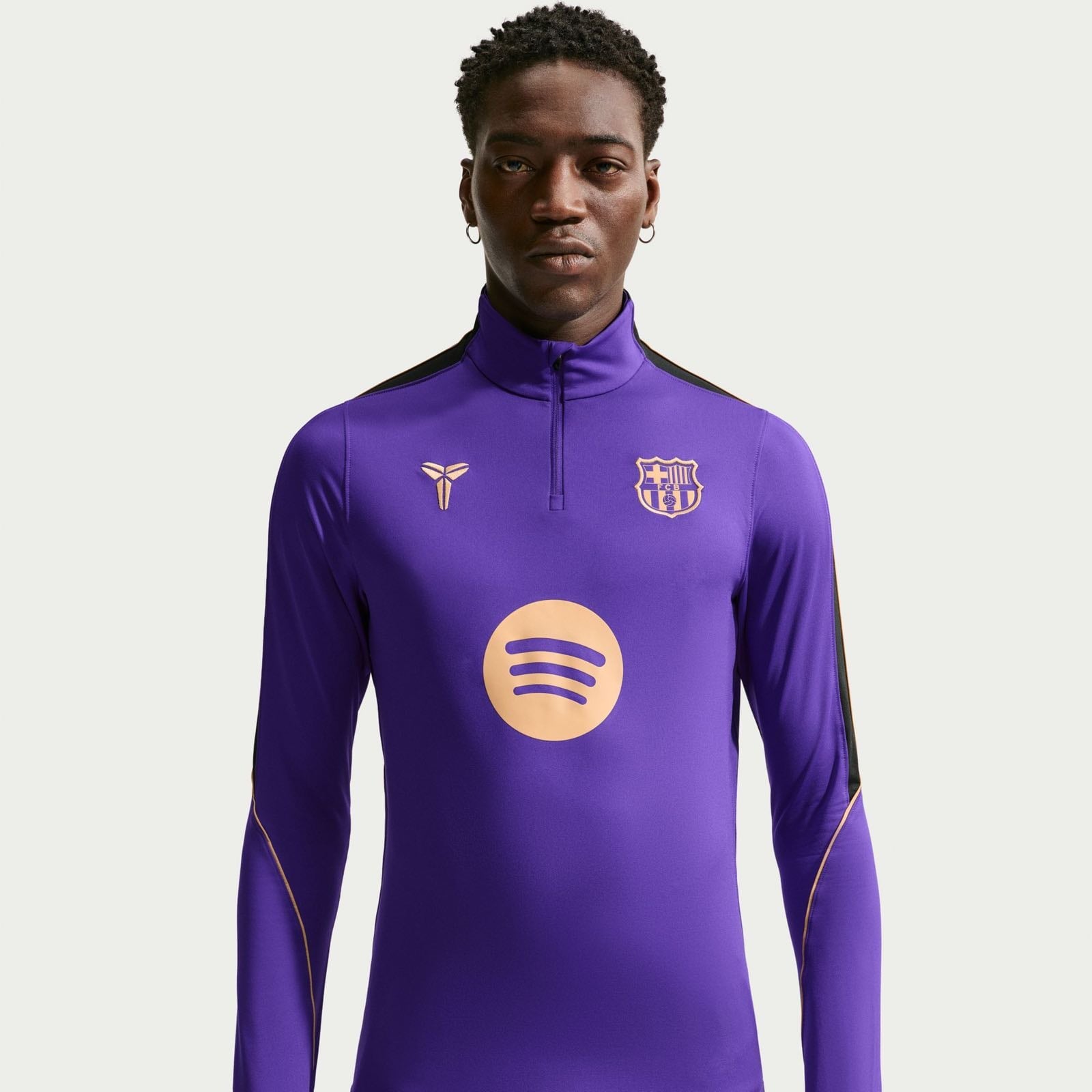 FC Barcelona Strike Away Kobe Dri-FIT soccer drill top in purple.