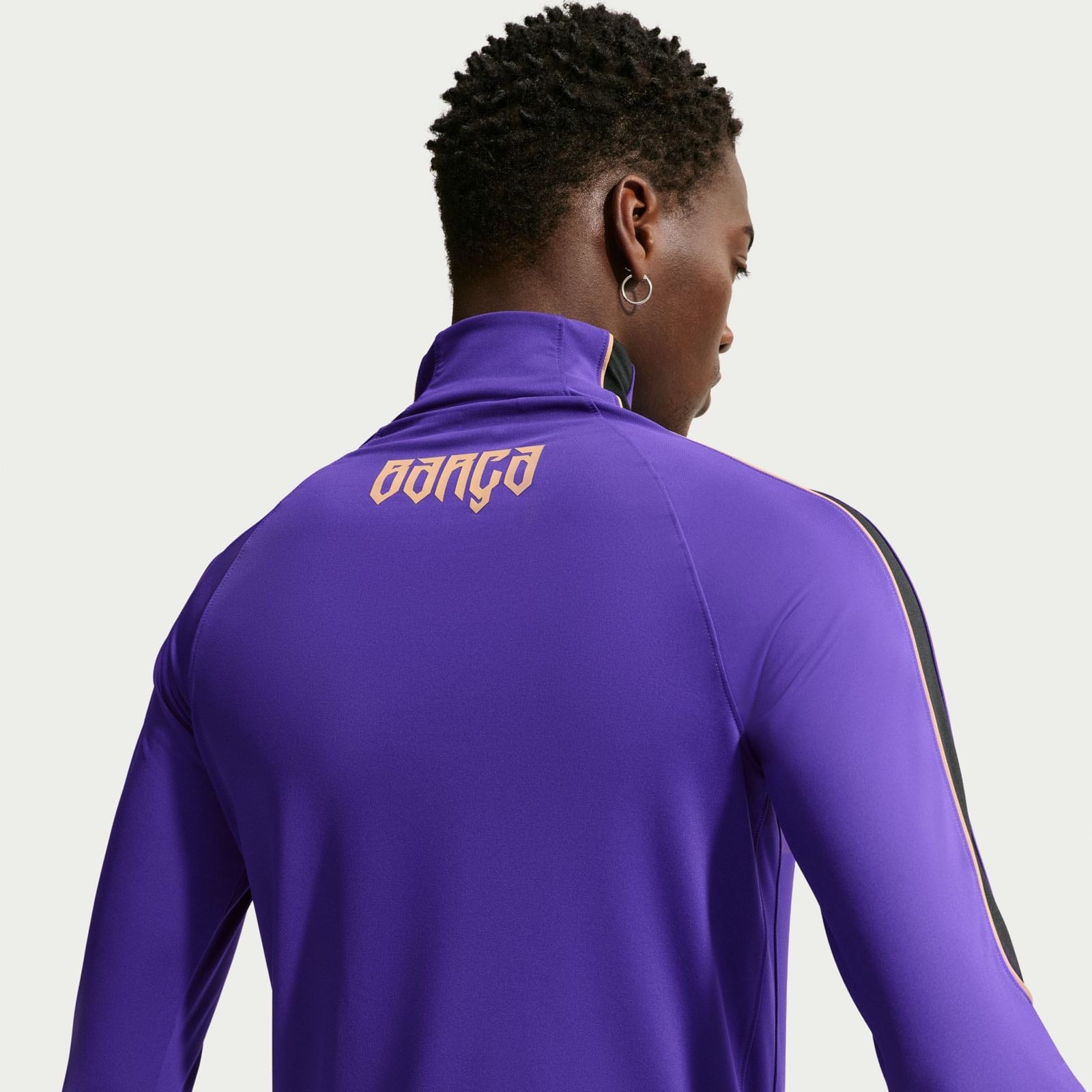 FC Barcelona Strike Away Kobe Dri-FIT soccer drill top in purple.