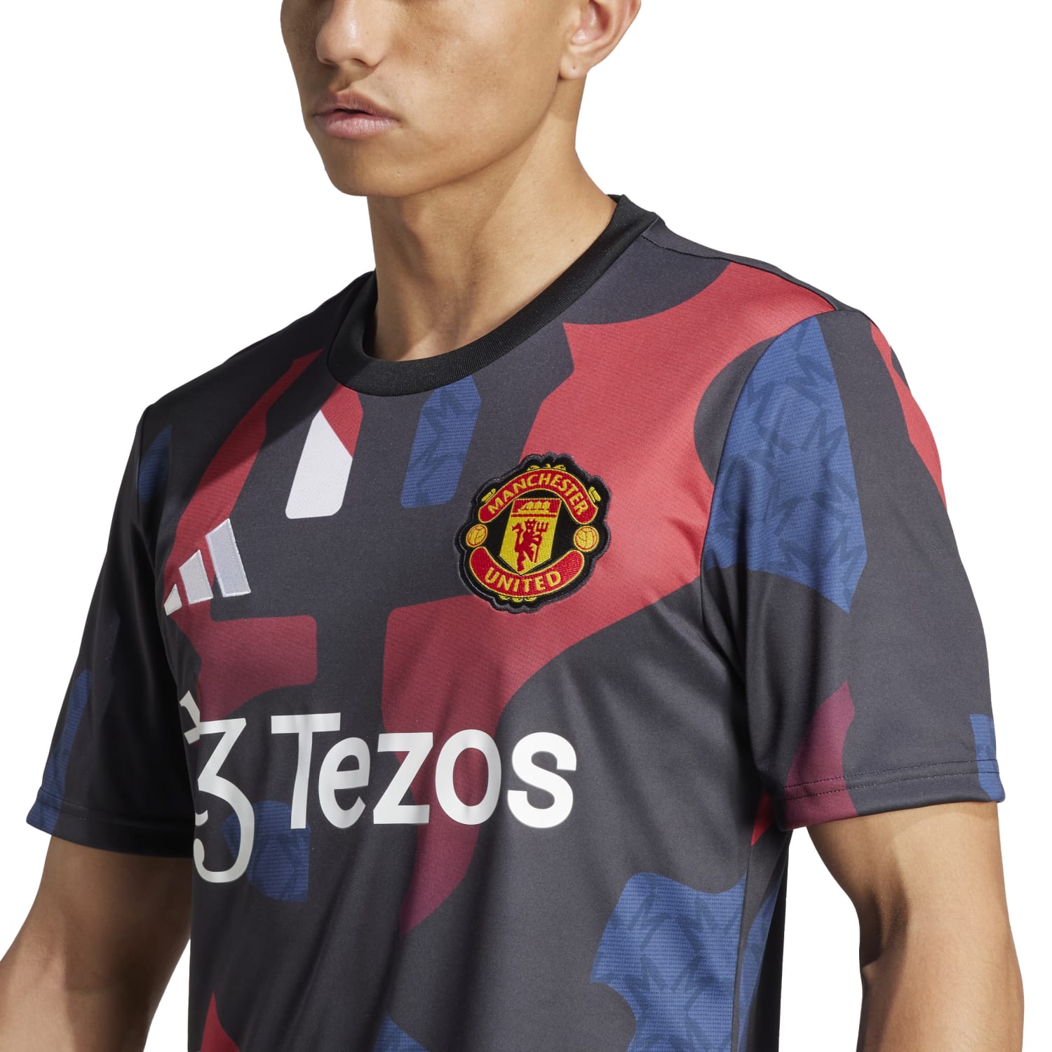 Manchester United Pre-Match Jersey with vibrant 2024/25 kit graphics, featuring AEROREADY technology and official club crest.