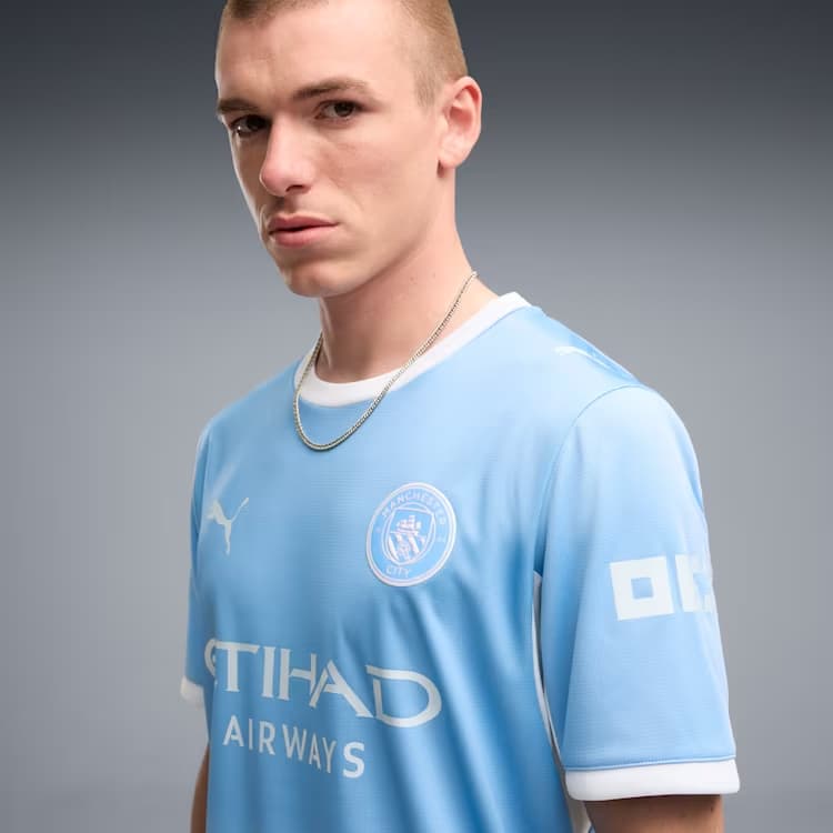 Manchester City Home Jersey close-up with official club crest